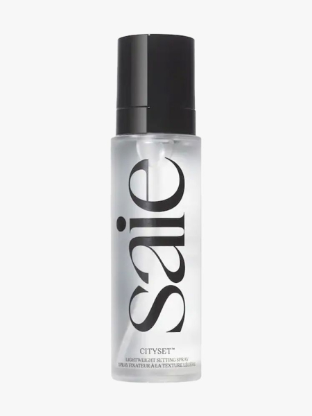 Saie CitySet Setting Spray in branded component on a light gray background